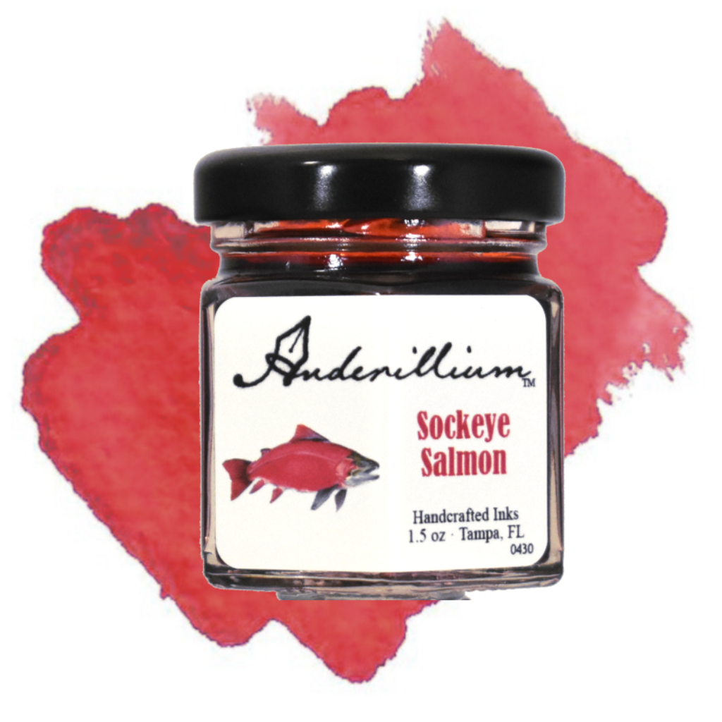 Jar of Andenillium Sockeye Salmon ink with a red paint swatch on a white background