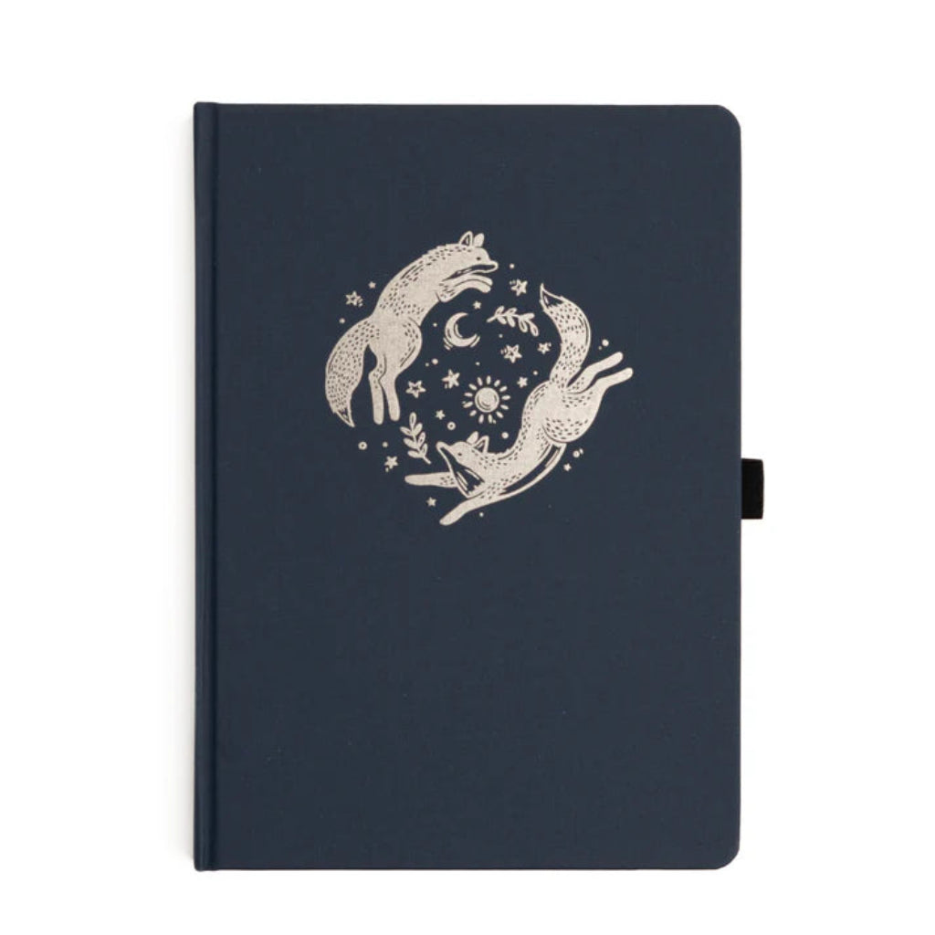 Archer & Olive notebook with white fox design on a blue background