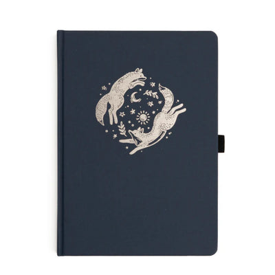 Archer & Olive notebook with white fox design on a blue background