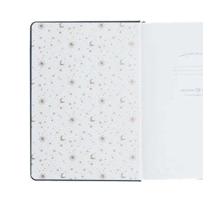 Archer & Olive notebook inside front cover with celestial pattern on cover