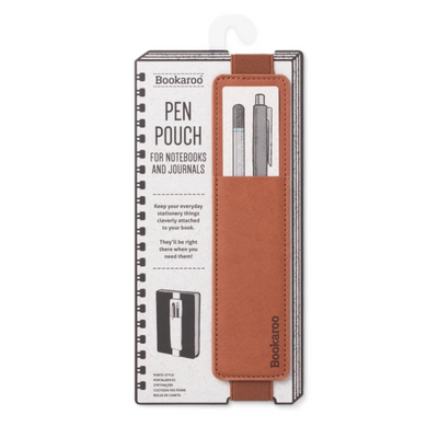 Brown pen pouch with notebooks and pens on a white background
