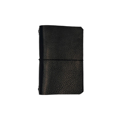 Black leather notebook on a white background