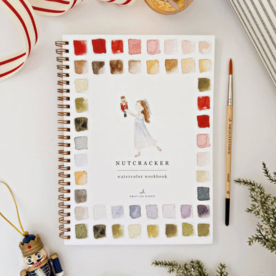 Emily Lex Studio Nutcracker Watercolor workbook front cover with color swatches on a white surface, available at Lighthouse Paper Co. in Melbourne, FL