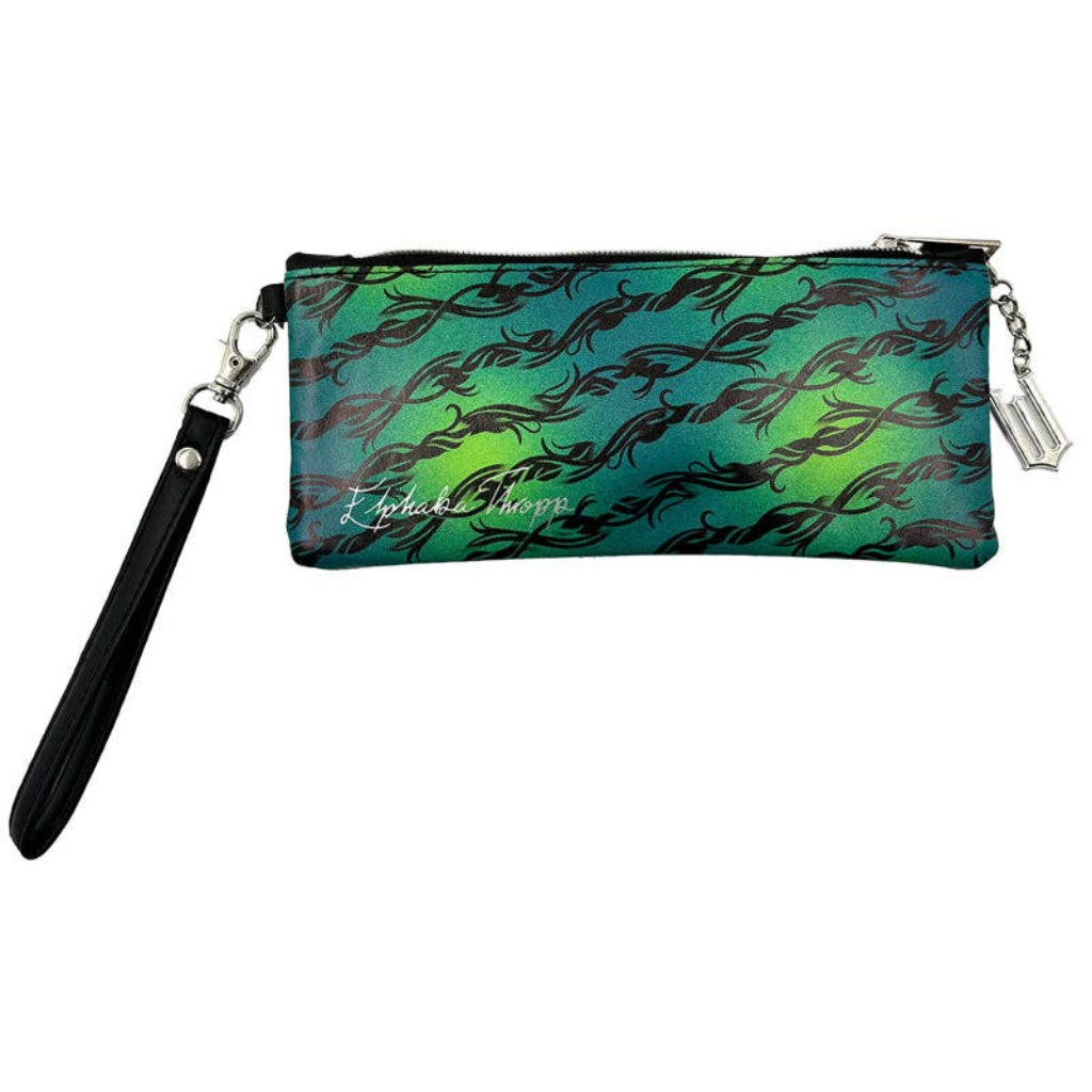 Green and black patterned pouch with a strap on a white background