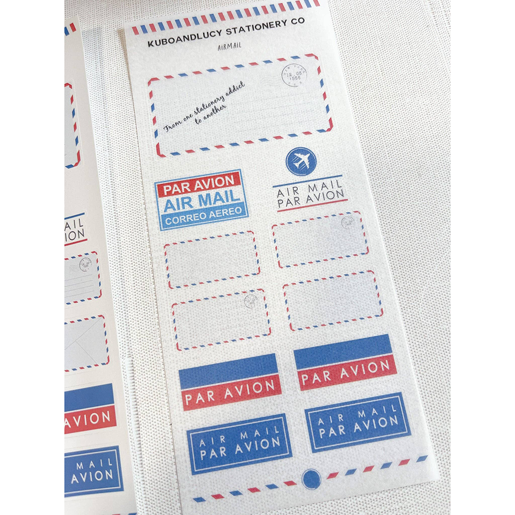 Sheet of air mail stickers with 'Par Avion' text on a white background