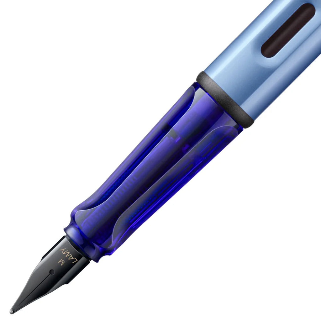 Blue fountain pen on a white background