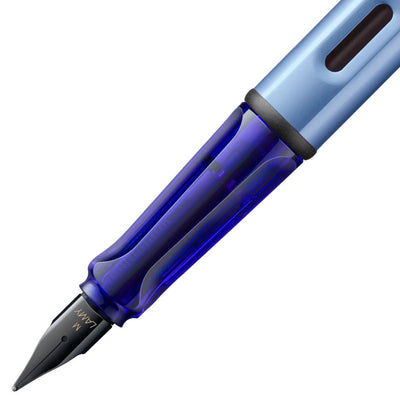 Blue fountain pen on a white background