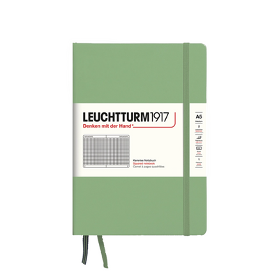 Green notebook with Leuchtturm1917 branding on a white background