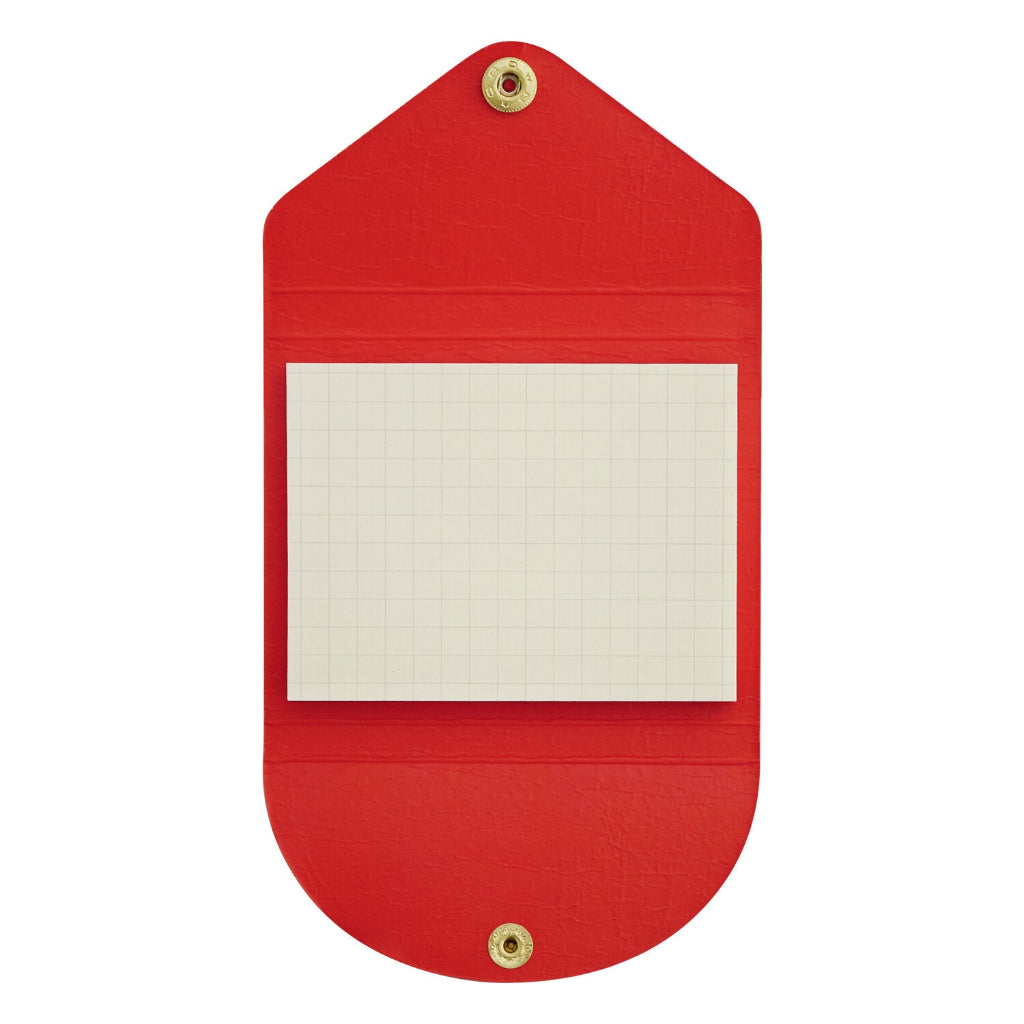 Red sticky note holder with a white notepad inside on a white background