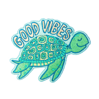 Embroidered patch of a turtle with 'Good Vibes' text on a white background
