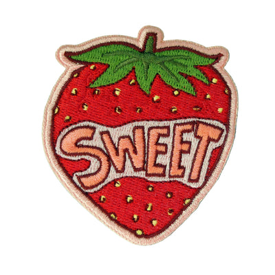 Embroidered patch shaped like a strawberry with the word 'SWEET' on a white background