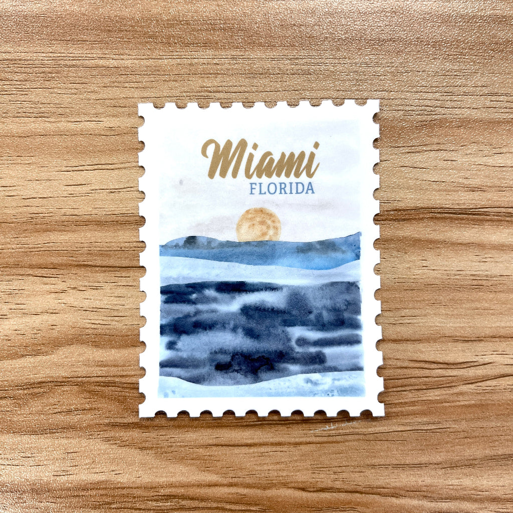 Stylized postage stamp with 'Miami Florida' text on a wooden surface