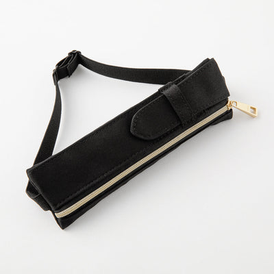 Black belt with a gold zipper on a white background