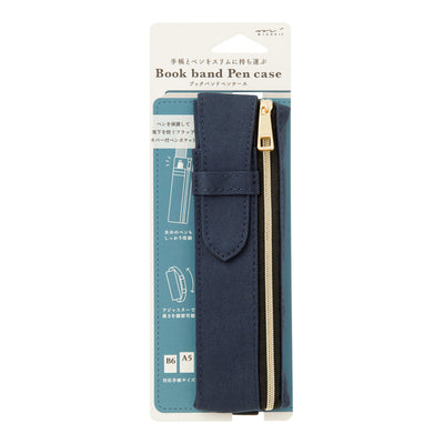 Navy blue book-shaped pen case with gold zipper on a white background