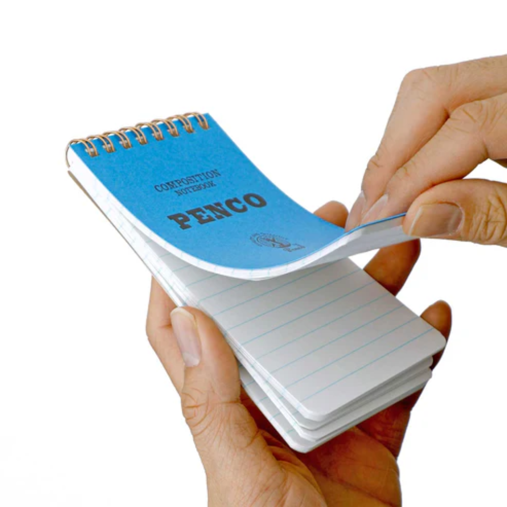 Penco notepad held in hand flipping through pages
