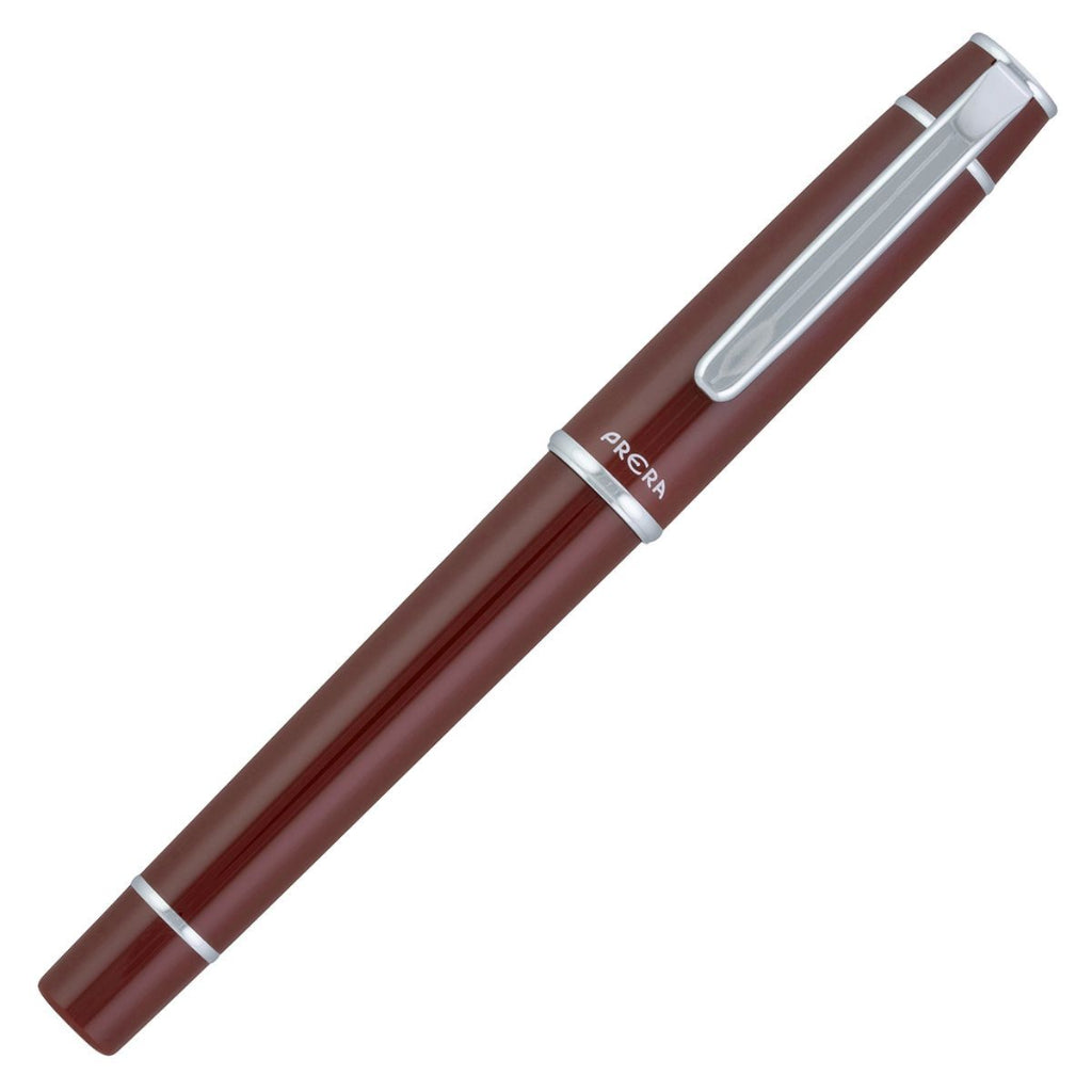 Brown pen with silver accents on a white background