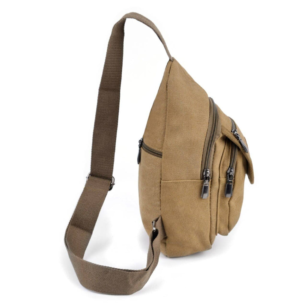 Brown sling bag with multiple zippers on a white background