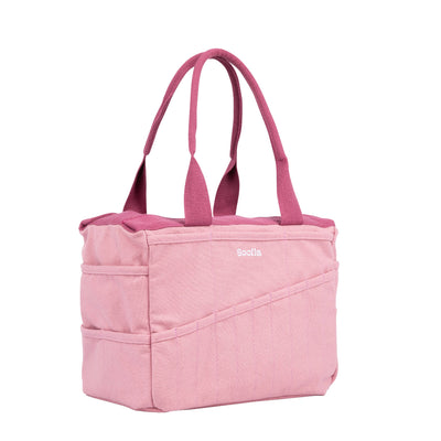 Pink tote bag with 'Scilla' branding on a white background