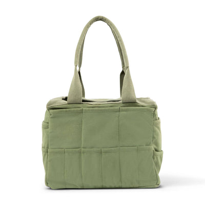 Green quilted tote bag on a white background