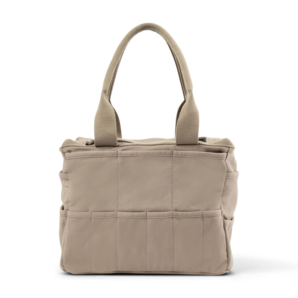 Beige tote bag with multiple pockets on a white background