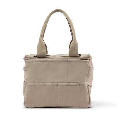 Beige tote bag with multiple pockets on a white background
