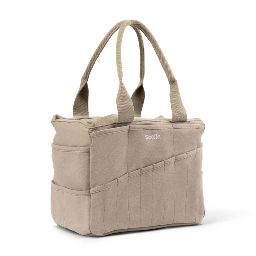 Beige tote bag with multiple pockets on a white background