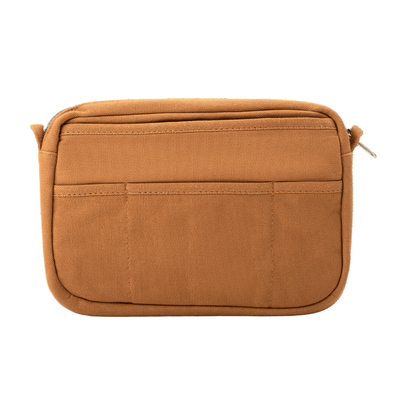 Brown bag with multiple compartments on a black background