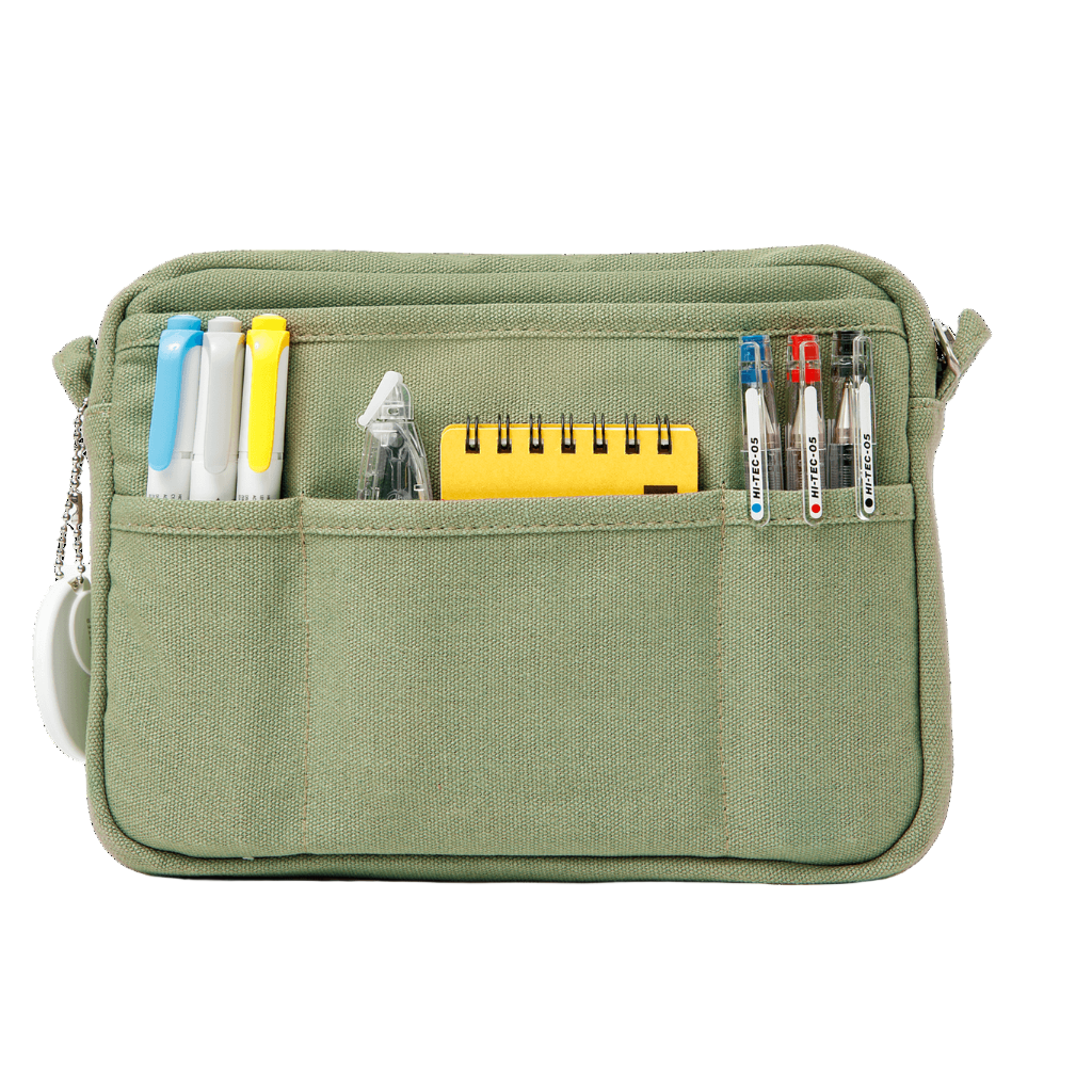 Green pouch with compartments holding stationery items on a white background