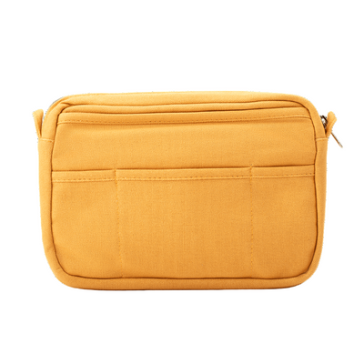 Yellow pouch with zippers on a black background