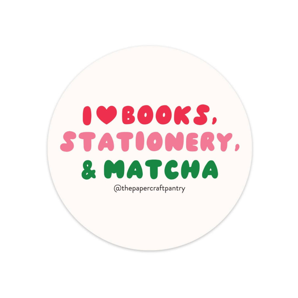 Round sticker with text 'I ❤️ books, stationery, & matcha' on a white background