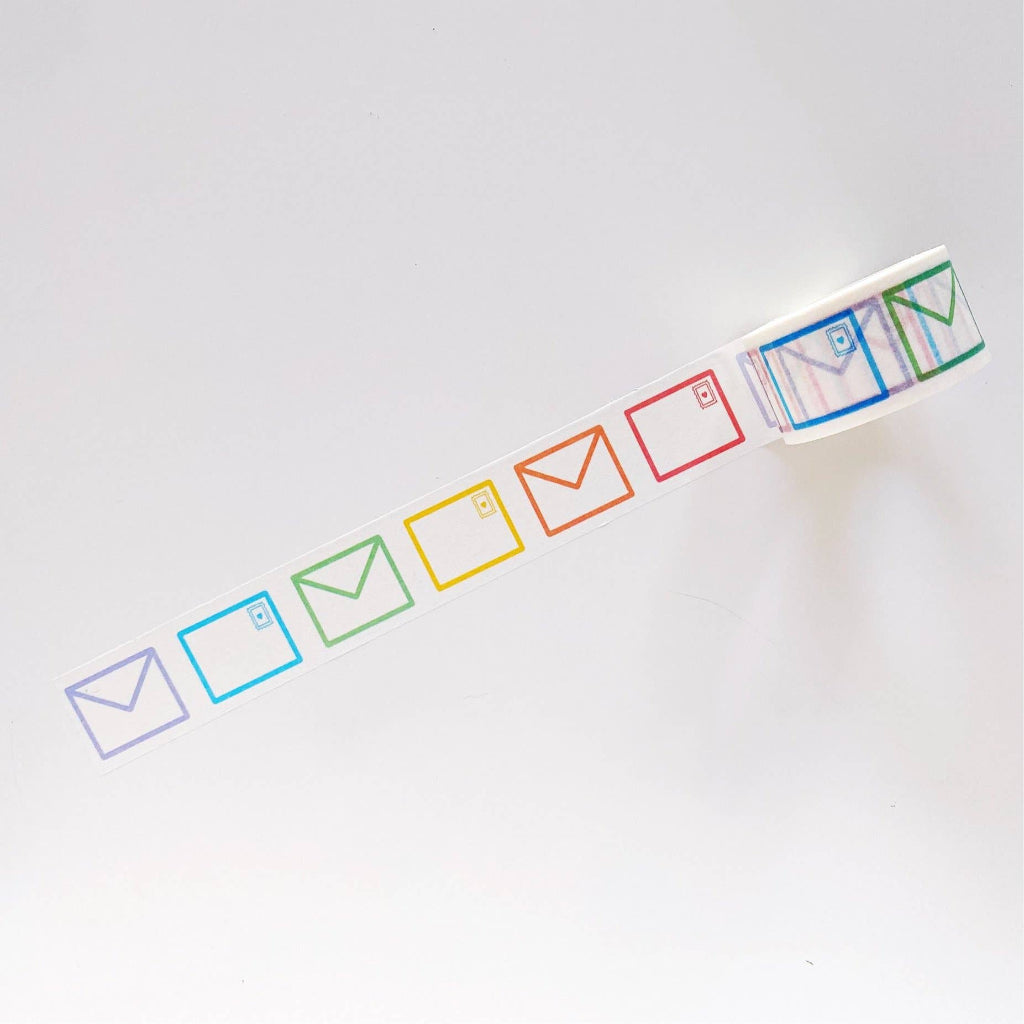 Colorful envelope-shaped washi tape on a white background