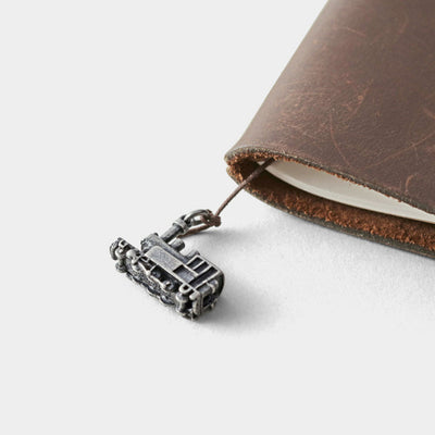 Traveler's Factory Charm, Train