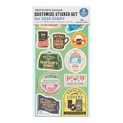 Pack of traveler's notebook customize sticker set for 2026 diary with various designs on a green background.
