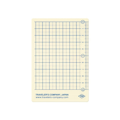 Grid notebook page with ruler from Traveler's Company on a white background