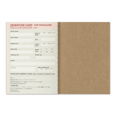 Departure card for travelers with a kraft paper cover on a white background