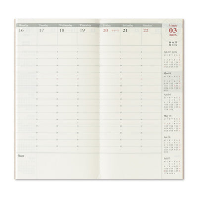 Monthly planner with calendar and notes section on a white background