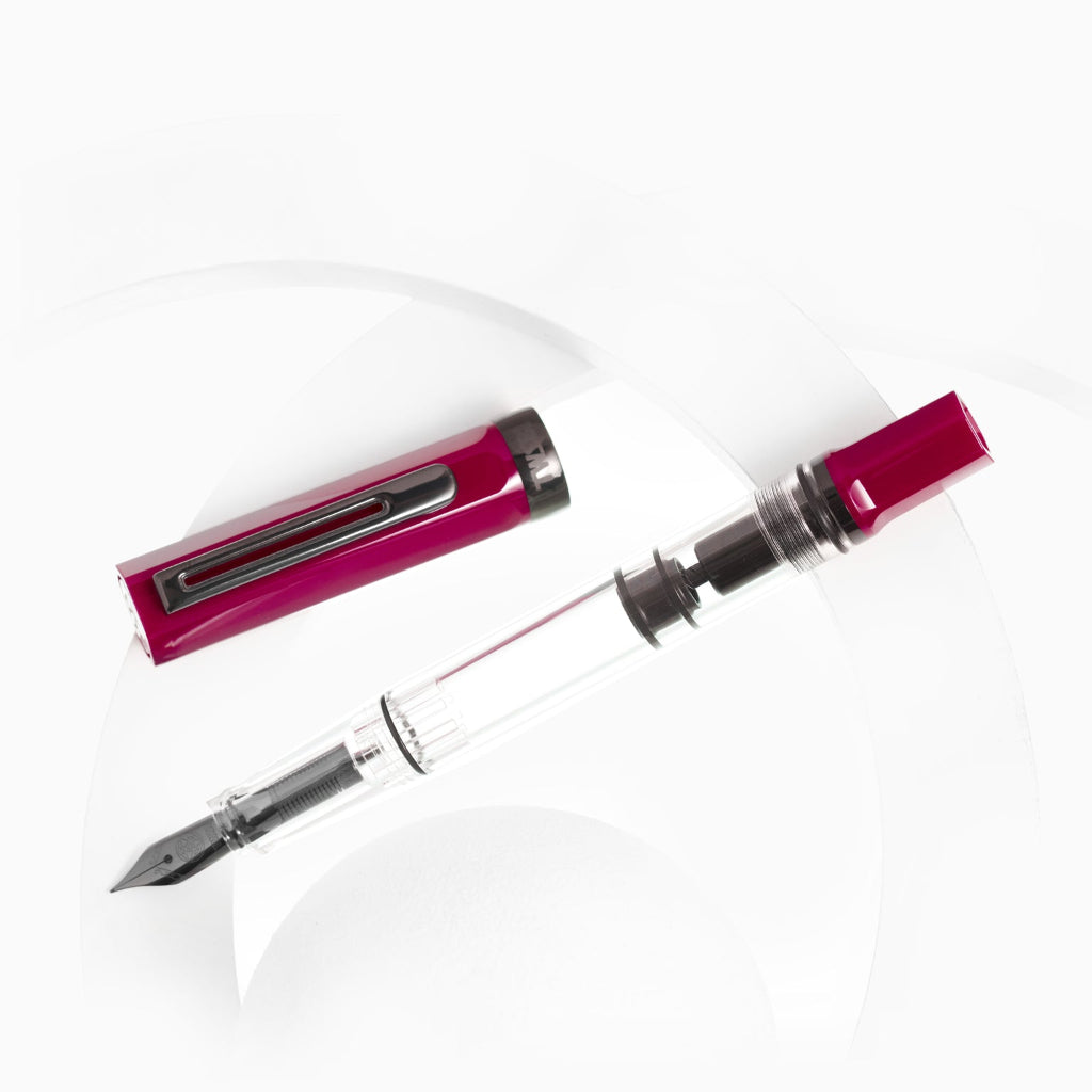 Fountain pen nib and clip on a white background