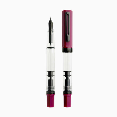 Fountain pen with a clear cartridge and red accents on a white background